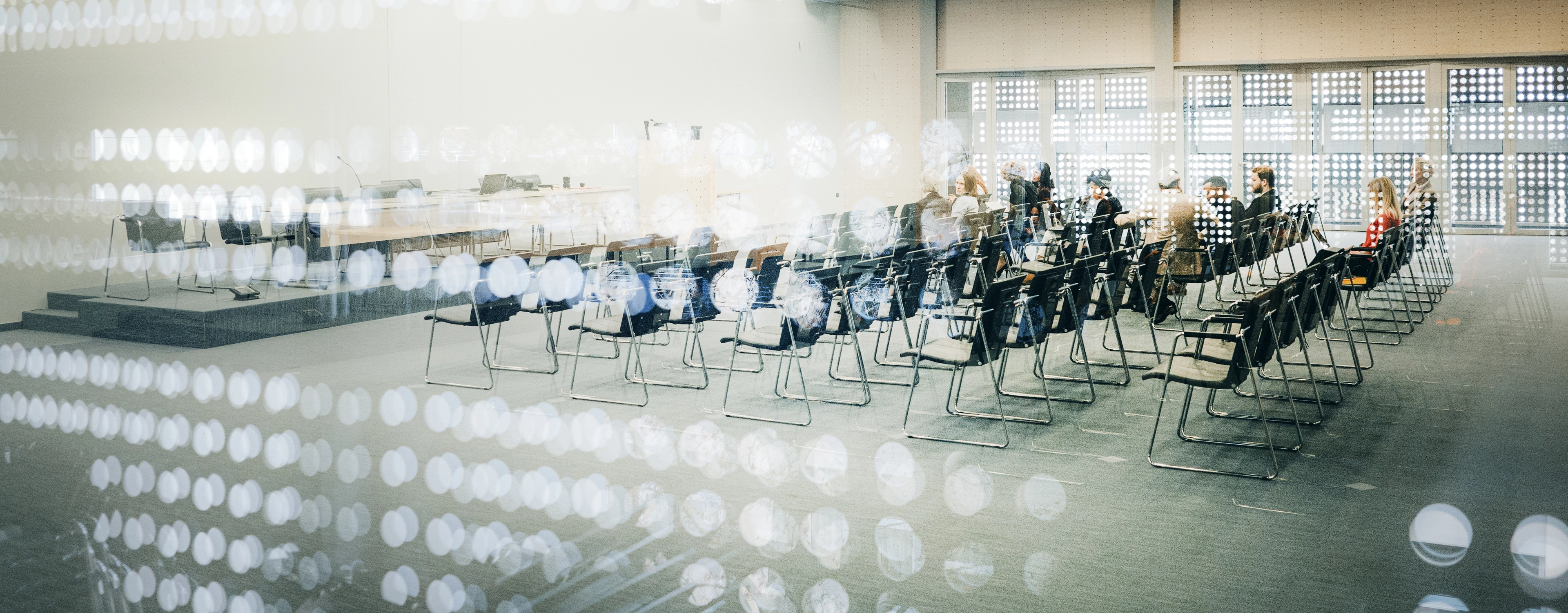Abstract group of business people in the convention center